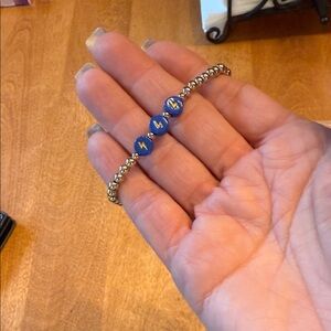 Marilyn Schiff elastic gold beaded lightning bolt bracelet